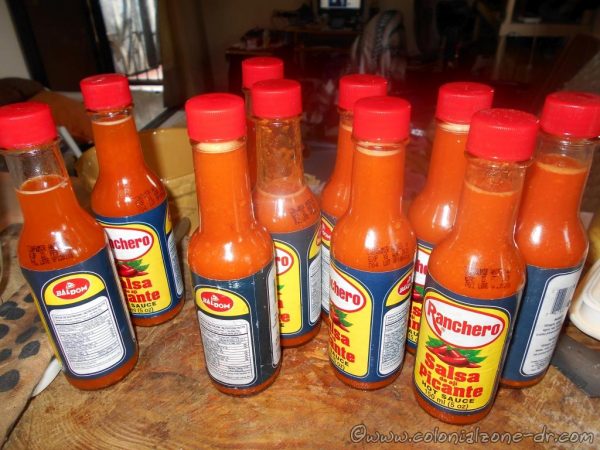 Almost 2 pounds of chilies cooked down into fiery sauce in bottles.
